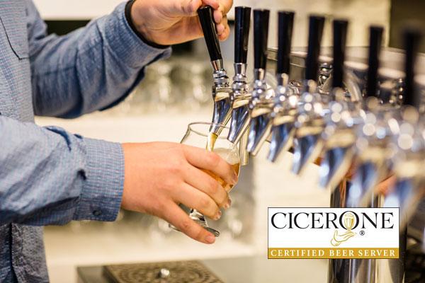 A photo of someone pouring beer from a faucet. There's a Certified Beer Server logo on top of the image.